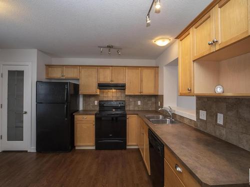 883 Oakland Boulevard, Devon, AB - Indoor Photo Showing Kitchen With Double Sink