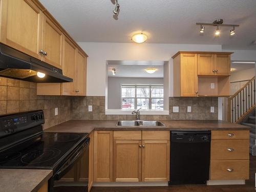 883 Oakland Boulevard, Devon, AB - Indoor Photo Showing Kitchen With Double Sink