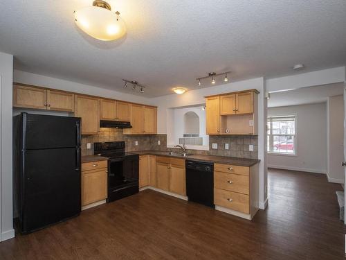 883 Oakland Boulevard, Devon, AB - Indoor Photo Showing Kitchen With Double Sink