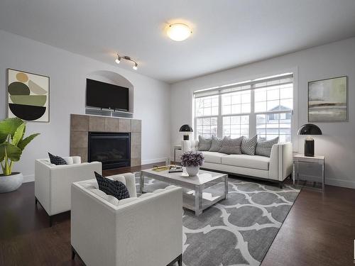 883 Oakland Boulevard, Devon, AB - Indoor Photo Showing Living Room With Fireplace