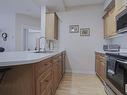 112 14259 50 Street, Edmonton, AB  - Indoor Photo Showing Kitchen With Double Sink 