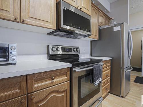 112 14259 50 Street, Edmonton, AB - Indoor Photo Showing Kitchen With Stainless Steel Kitchen