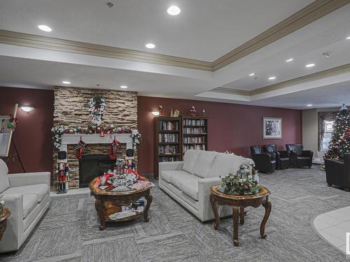 112 14259 50 Street, Edmonton, AB - Indoor Photo Showing Living Room With Fireplace