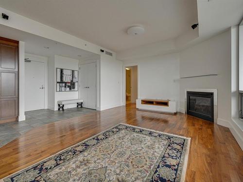 503 10035 Saskatchewan Drive, Edmonton, AB - Indoor Photo Showing Living Room With Fireplace