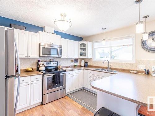 3608 41 Street, Leduc, AB - Indoor Photo Showing Kitchen With Double Sink