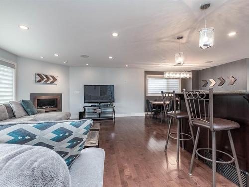 7416 104A Avenue, Edmonton, AB - Indoor Photo Showing Living Room With Fireplace