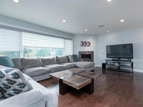 7416 104A Avenue, Edmonton, AB - Indoor Photo Showing Living Room With Fireplace