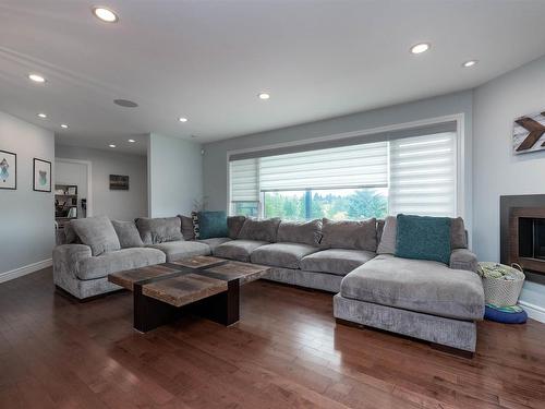 7416 104A Avenue, Edmonton, AB - Indoor Photo Showing Living Room With Fireplace