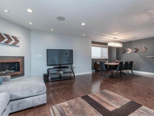 7416 104A Avenue, Edmonton, AB - Indoor Photo Showing Living Room With Fireplace