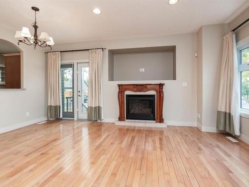 10651 68 Ave 6711 107 St Avenue, Edmonton, AB - Indoor Photo Showing Living Room With Fireplace