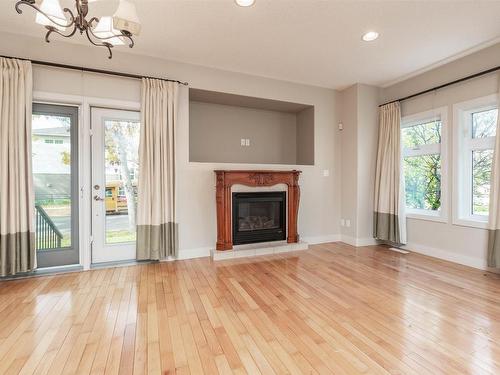 10651 68 Ave 6711 107 St Avenue, Edmonton, AB - Indoor Photo Showing Living Room With Fireplace