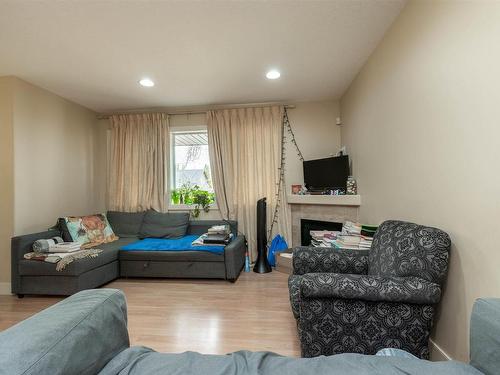 10651 68 Ave 6711 107 St Avenue, Edmonton, AB - Indoor Photo Showing Living Room With Fireplace