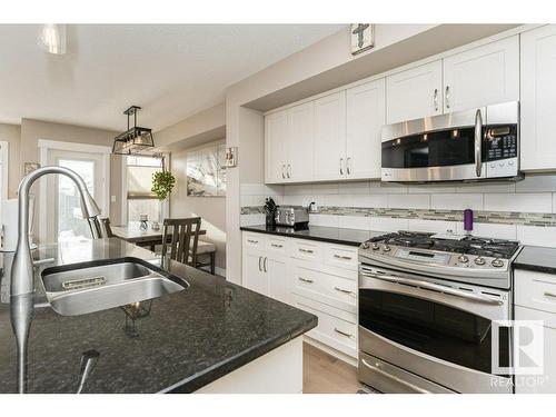 3047 Harvey Crescent, Edmonton, AB - Indoor Photo Showing Kitchen With Double Sink