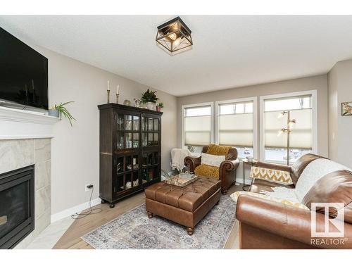 3047 Harvey Crescent, Edmonton, AB - Indoor Photo Showing Living Room With Fireplace