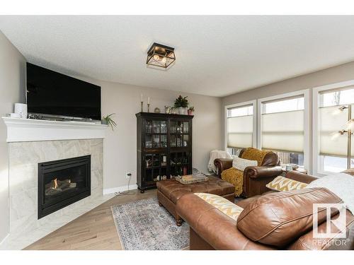 3047 Harvey Crescent, Edmonton, AB - Indoor Photo Showing Living Room With Fireplace