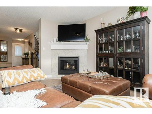 3047 Harvey Crescent, Edmonton, AB - Indoor Photo Showing Living Room With Fireplace