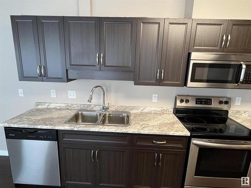 203 4002 47 Street, Drayton Valley, AB - Indoor Photo Showing Kitchen With Double Sink With Upgraded Kitchen