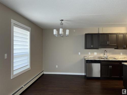 203 4002 47 Street, Drayton Valley, AB - Indoor Photo Showing Kitchen With Double Sink