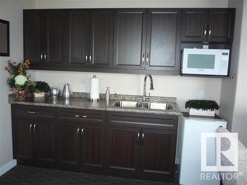 203 4002 47 Street, Drayton Valley, AB - Indoor Photo Showing Kitchen With Double Sink