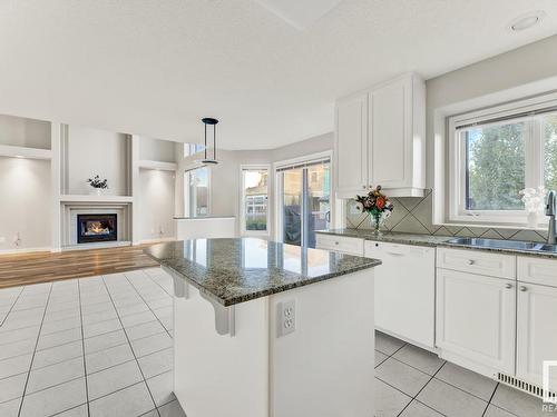 164 Darlington Crescent, Edmonton, AB - Indoor Photo Showing Kitchen With Fireplace