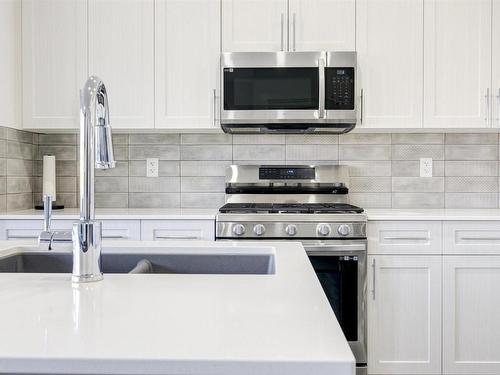 5795 Cautley Crescent, Edmonton, AB - Indoor Photo Showing Kitchen With Double Sink With Upgraded Kitchen