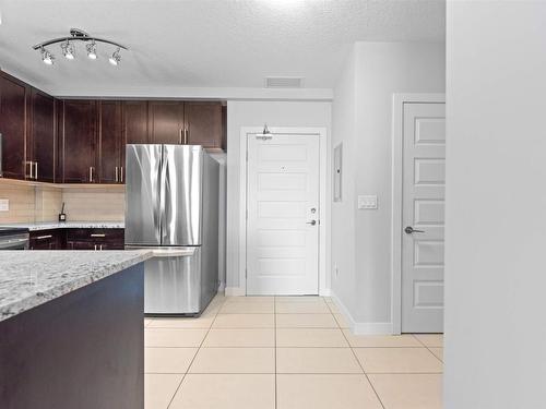 410 5151 Windermere Bv, Edmonton, AB - Indoor Photo Showing Kitchen With Stainless Steel Kitchen