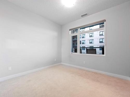 410 5151 Windermere Bv, Edmonton, AB - Indoor Photo Showing Other Room