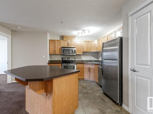 222 300 Spruce Ridge Road, Spruce Grove, AB - Indoor Photo Showing Kitchen With Stainless Steel Kitchen