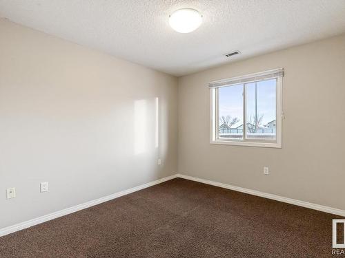 222 300 Spruce Ridge Road, Spruce Grove, AB - Indoor Photo Showing Other Room