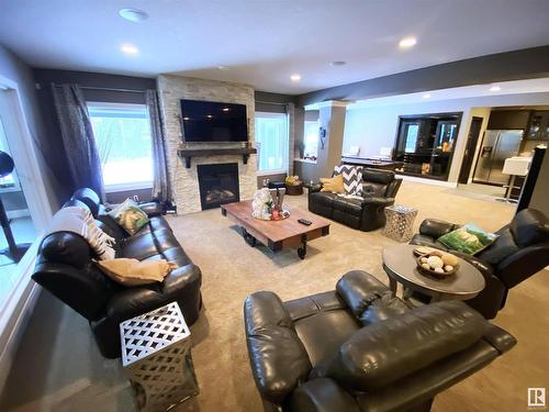 2 53120 Rge Road 15, Rural Parkland County, AB - Indoor Photo Showing Living Room With Fireplace