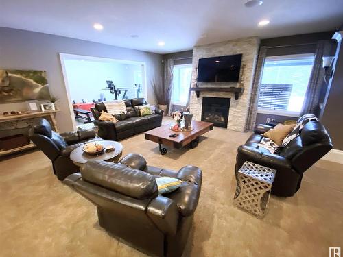 2 53120 Rge Road 15, Rural Parkland County, AB - Indoor Photo Showing Living Room With Fireplace