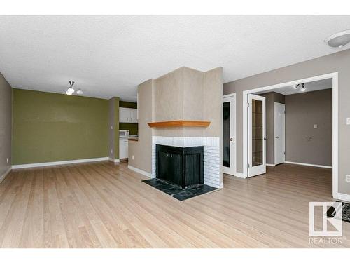 5756 172 Street, Edmonton, AB - Indoor Photo Showing Living Room With Fireplace