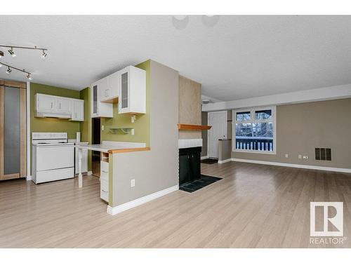 5756 172 Street, Edmonton, AB - Indoor Photo Showing Kitchen With Fireplace