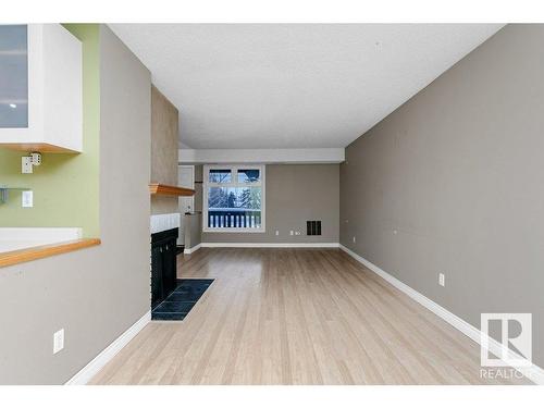 5756 172 Street, Edmonton, AB - Indoor Photo Showing Other Room With Fireplace