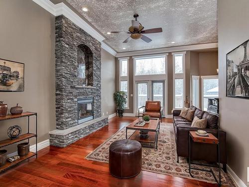 31-20508 Township Road 502, Rural Beaver County, AB - Indoor Photo Showing Living Room With Fireplace