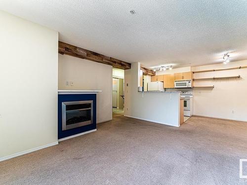 320 17003 67 Avenue, Edmonton, AB - Indoor With Fireplace