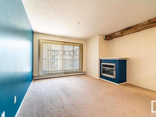 320 17003 67 Avenue, Edmonton, AB - Indoor With Fireplace