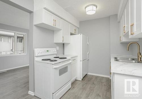 9 8115 144 Avenue, Edmonton, AB - Indoor Photo Showing Kitchen With Double Sink