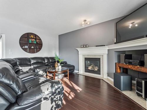 7111 168 Avenue, Edmonton, AB - Indoor Photo Showing Living Room With Fireplace