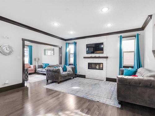 3223 Allan Way, Edmonton, AB - Indoor Photo Showing Living Room With Fireplace