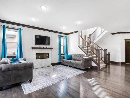 3223 Allan Way, Edmonton, AB - Indoor Photo Showing Living Room With Fireplace