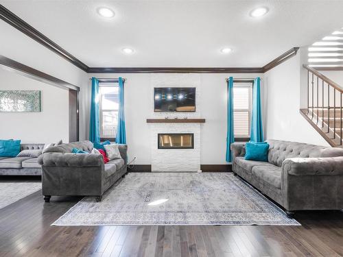 3223 Allan Way, Edmonton, AB - Indoor Photo Showing Living Room With Fireplace