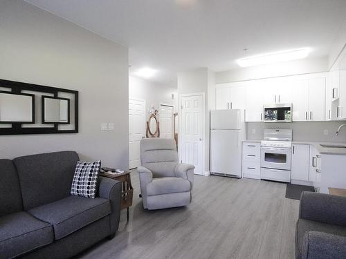 132 8802 Southfort Drive, Fort Saskatchewan, AB - Indoor Photo Showing Living Room