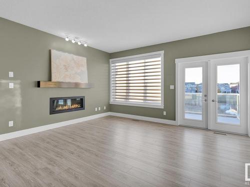 8716 218 Street, Edmonton, AB - Indoor Photo Showing Living Room With Fireplace