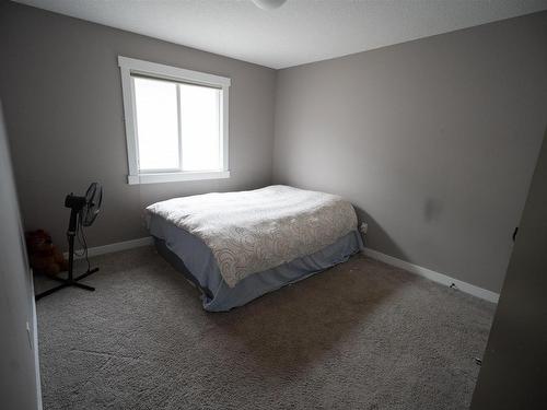 711 57 Street Sw, Edmonton, AB - Indoor Photo Showing Bedroom