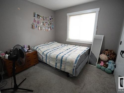 711 57 Street Sw, Edmonton, AB - Indoor Photo Showing Bedroom