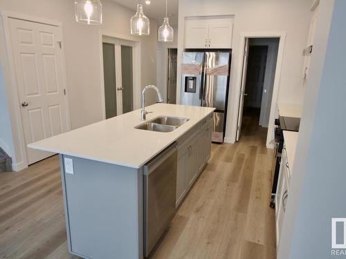 Upper 8866 Carson Way, Edmonton, AB - Indoor Photo Showing Kitchen With Double Sink