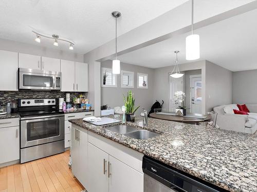 9864 221 Street, Edmonton, AB - Indoor Photo Showing Kitchen With Stainless Steel Kitchen With Double Sink