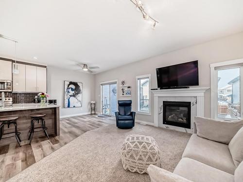 154 Spruce Gardens Crescent, Spruce Grove, AB - Indoor Photo Showing Living Room With Fireplace