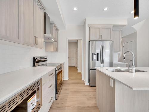 4855 Hawthorn Bend, Edmonton, AB - Indoor Photo Showing Kitchen With Stainless Steel Kitchen With Double Sink With Upgraded Kitchen